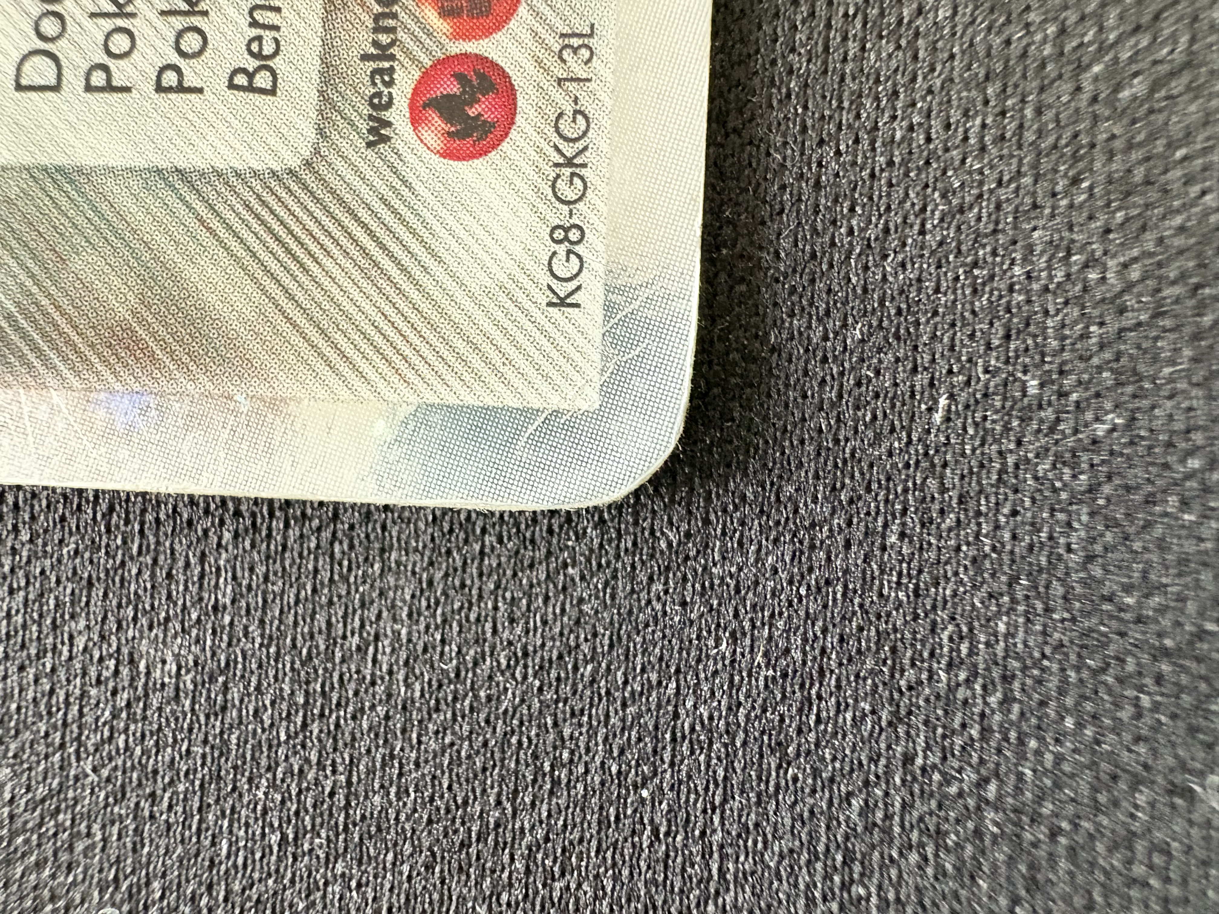 Bottom-left corner. Also, notice the creases here